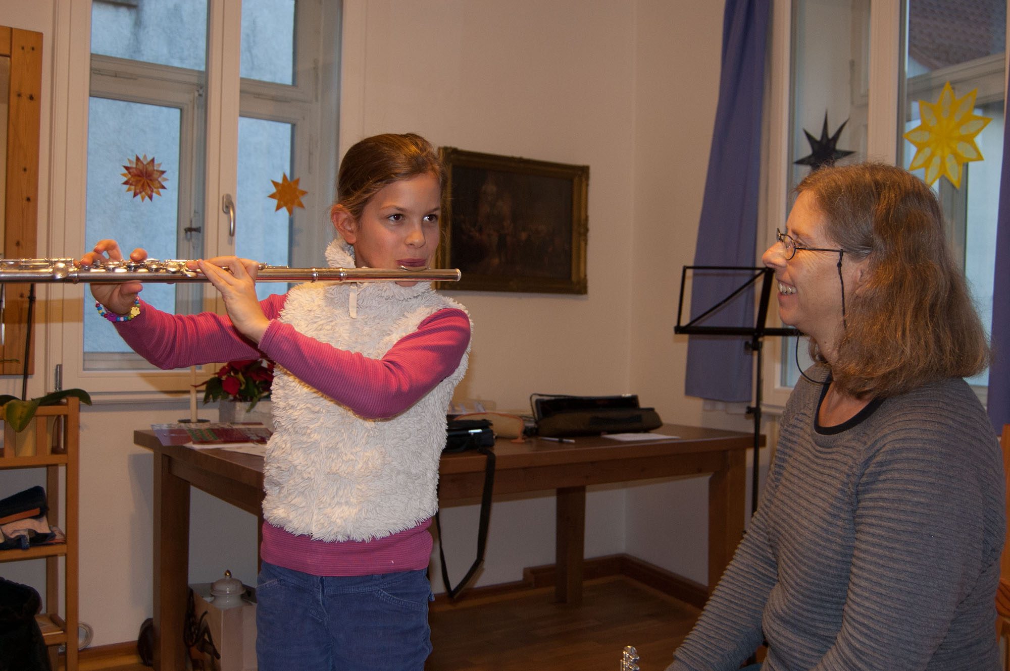 Querflöte spielen mit Kind